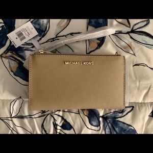 Brand new Michael Kors travel wallet
